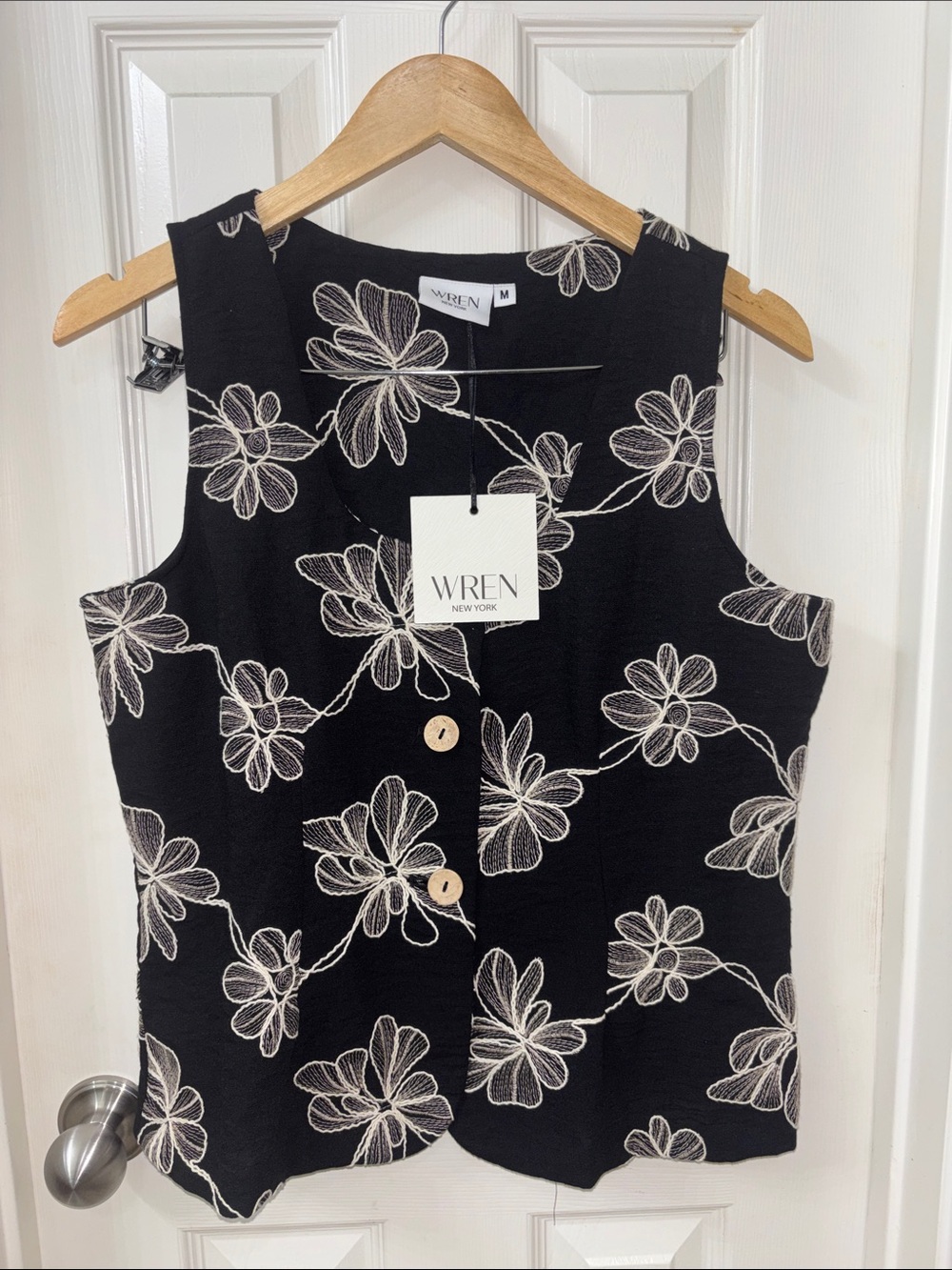 Wren Black Sleeveless Button-Front Top with Cream Floral Embroidery